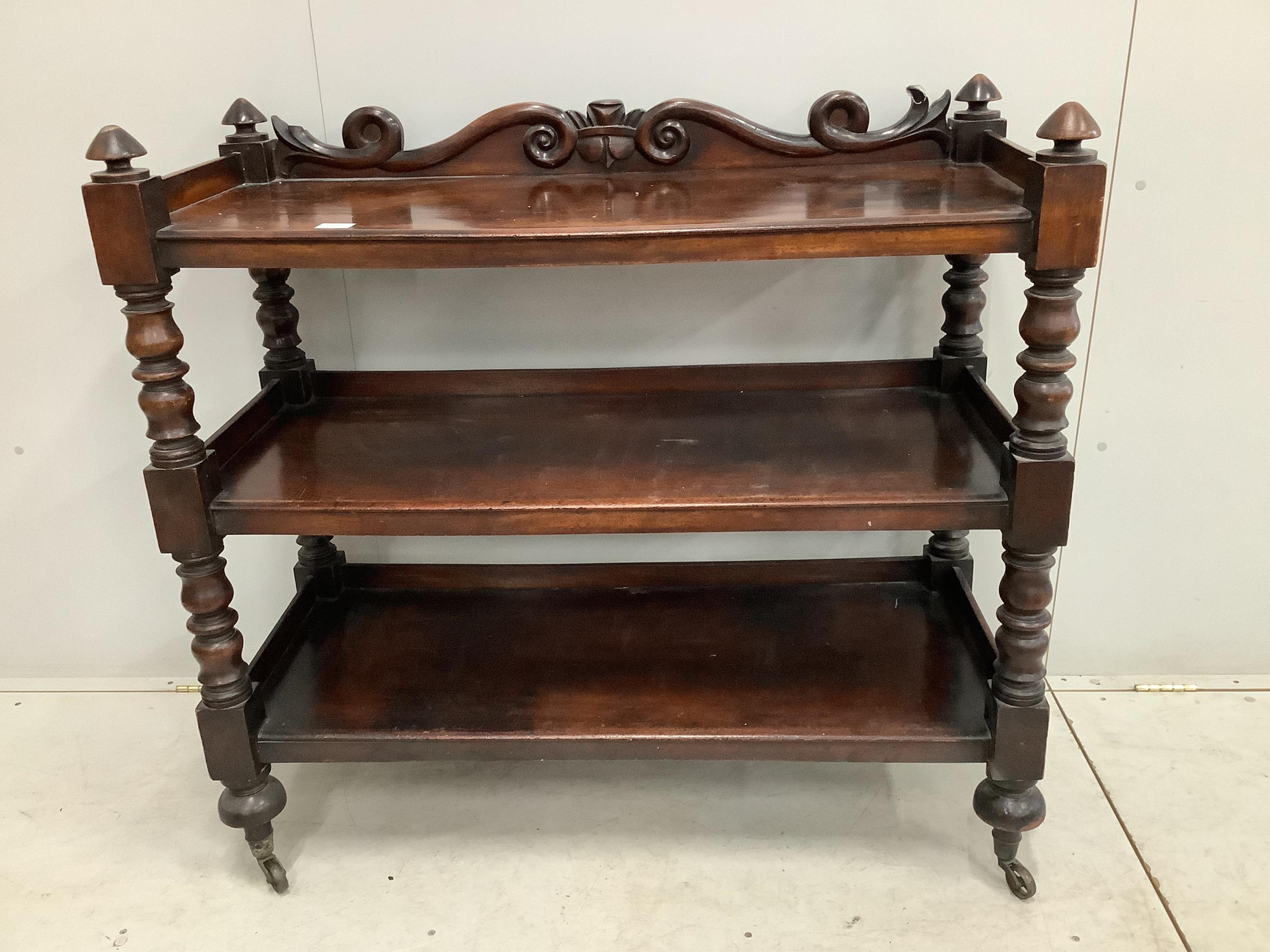 An early Victorian mahogany three tier buffet, width 114cm, depth 49cm, height 108cm. Condition - fair